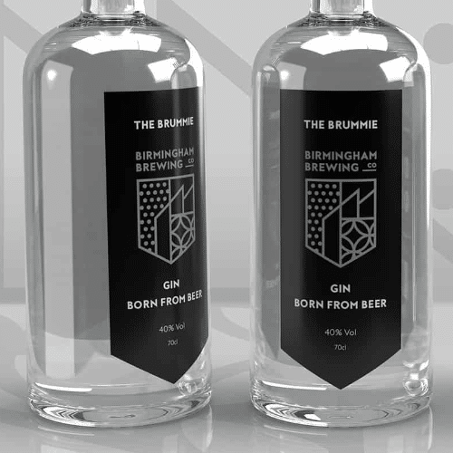 A close up photo of a gin bottle with The Brummie Gin black label