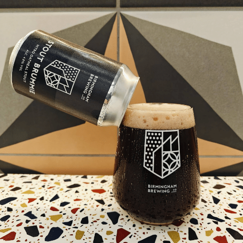 A photo showing one of our stout beers in a can being pored into a Birmingham Brewing Company branded glass